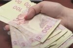 Деньги. Фото: скриншот YouTube-видео