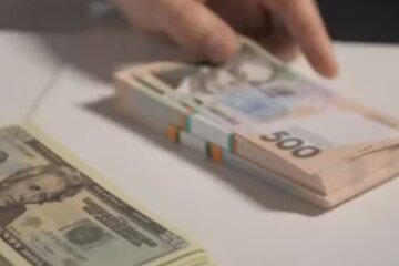 Деньги. Фото: скриншот YouTube-видео