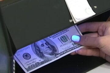 Доллар. Фото: скриншот Youtube-видео