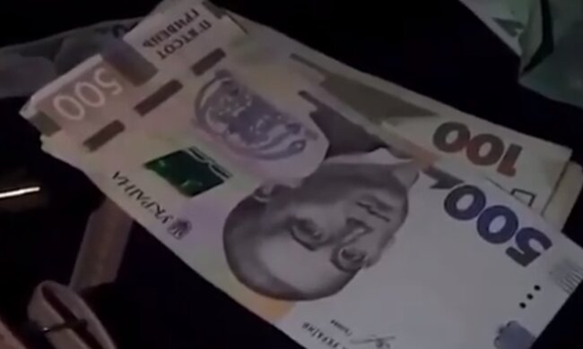 Деньги. Фото: скриншот YouTube-видео