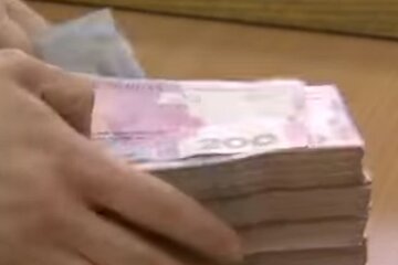 Гроші. Фото: скріншот YouTube-відео