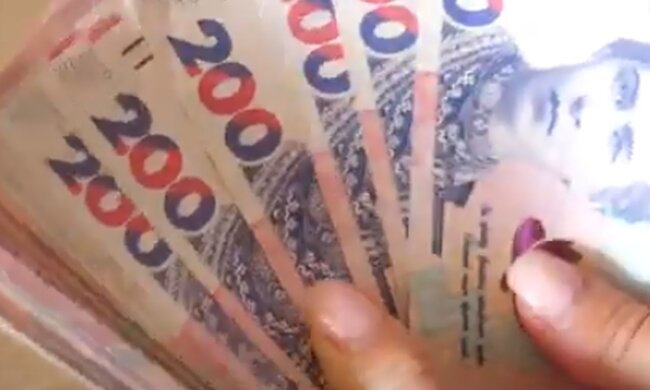 Деньги. Фото: скриншот YouTube-видео