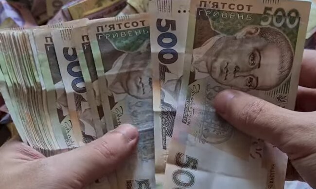 Деньги.  Фото: скриншот YouTube-видео