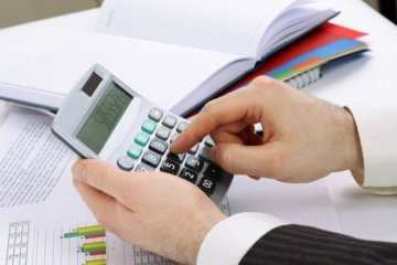 Калькулятор, фото: inva.kz