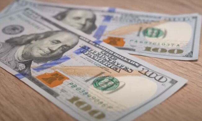 Доллары. Фото: скриншот YouTube-видео