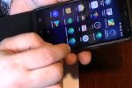 Смартфоон в руке. Фото: скриншот YouTube