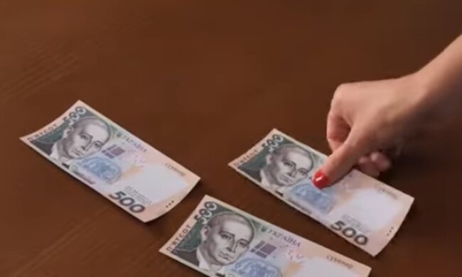Купюры в 500 грн. Фото: скриншот YouTube-видео