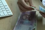 Деньги.  Фото: скриншот YouTube-видео
