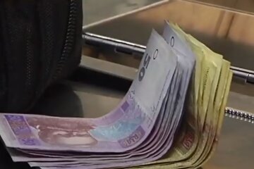 Деньги. Фото: скриншот YouTube-видео