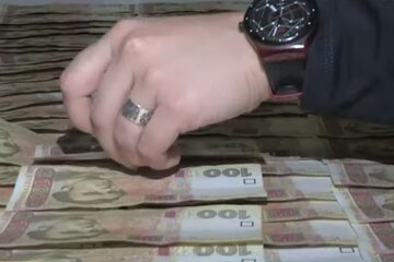Гроші. Фото: скріншот YouTube-відео
