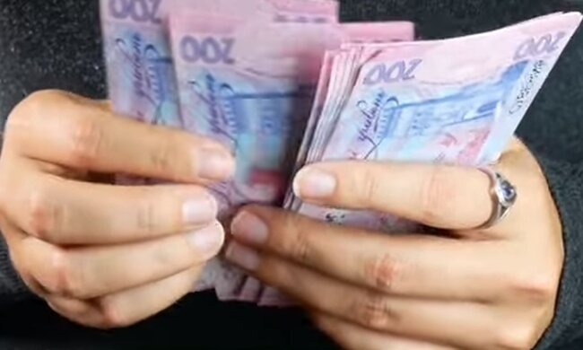 Деньги. Фото: скриншот YouTube-видео