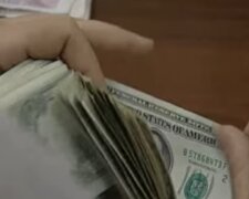 Долар. Фото: скріншот YouTube