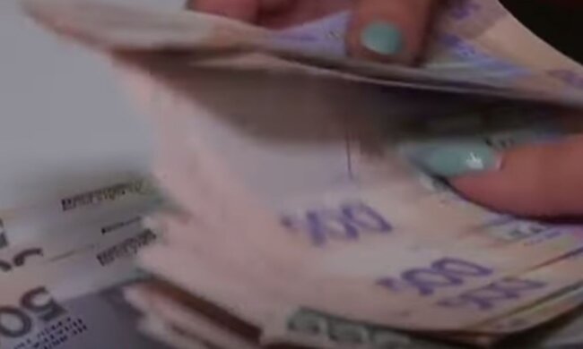 Деньги. Фото: скриншот YouTube-видео