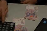 Деньги. Фото: скриншот YouTube-видео