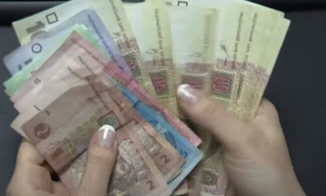 Деньги. Фото: скриншот YouTube-видео