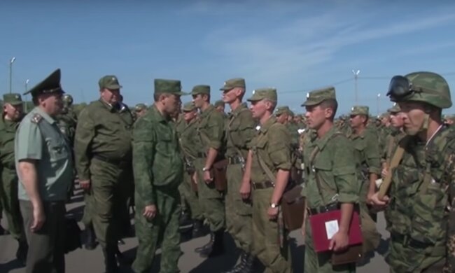 Российские оккупанты. Фото: YouTube, скрин