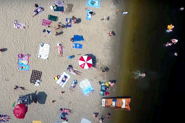 Названо минимальную температуру воды, при которой можно купаться в речке. Фото: YouTube