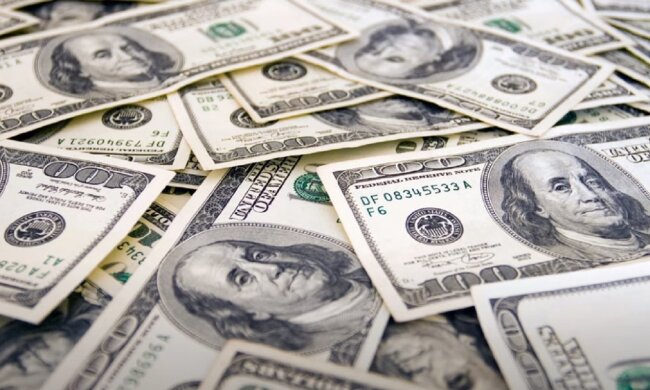 Стодолларовые купюры. Фото: скриншот Youtube